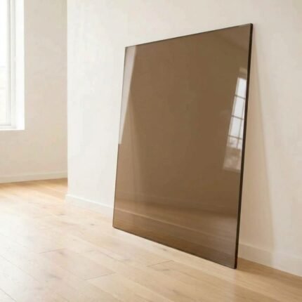 6mm bronze tinted glass panel cut to size with polished edges, leaning against a white wall